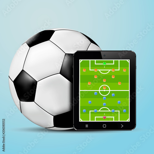 Tablet with soccer team formation screen and soccer ball