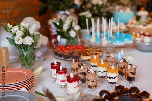 Candy Bar. Delicious sweet buffet with cupcakes. Sweet holiday buffet with cupcakes and other desserts.