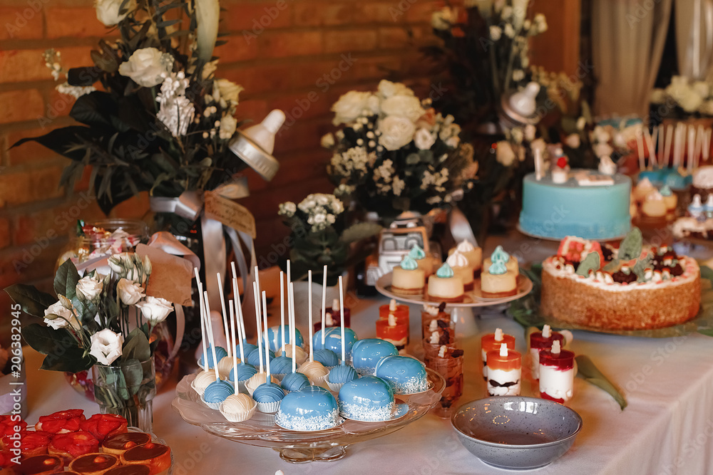 Candy Bar. Delicious sweet buffet with cupcakes. Sweet holiday buffet with cupcakes and other desserts. Candy Bar. Delicious sweet buffet with cupcakes. Sweet holiday buffet with cupcakes and other desserts.
