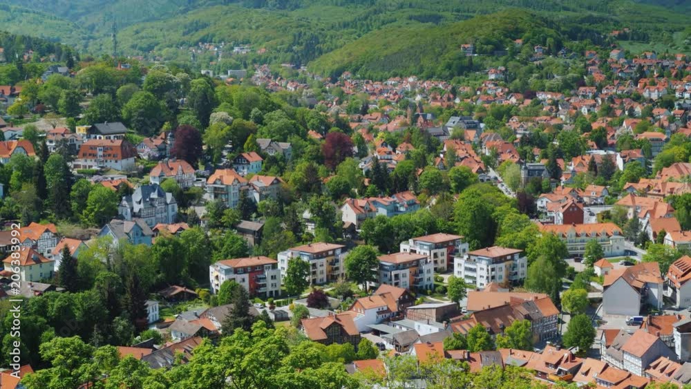 Pan shot: View from the top of the picturesque town of Wernigerode - a city in Germany in the federal state of Saxony Pan shot: View from the top of the picturesque town of Wernigerode - a city in Germany in the federal state of Saxony