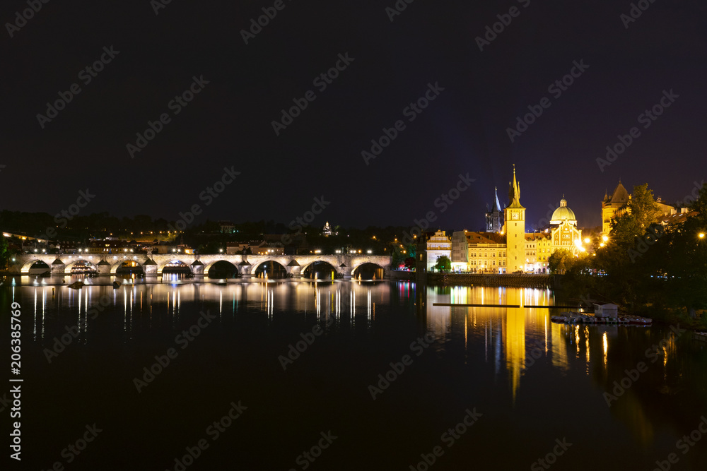 Obraz premium Czech Republic, view of Prague at night, Charles Bridge and Prague Castle in the light of street lamps