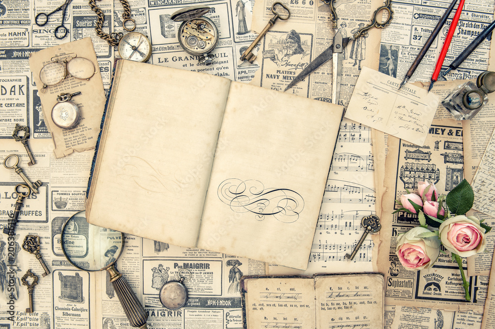 Obraz premium Antique collectible goods books postcards news paper vintage