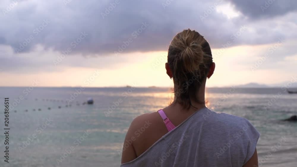 Woman enjoying, admire sunset on beach near sea, super slow motion 240fps
Woman enjoying, admire sunset on beach near sea, super slow motion 240fps