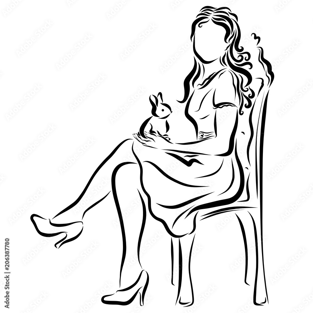 Beautiful young lady with a rabbit in her arms, sitting on a chair