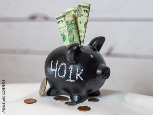 401k Written On Black Piggy Bank_Wide