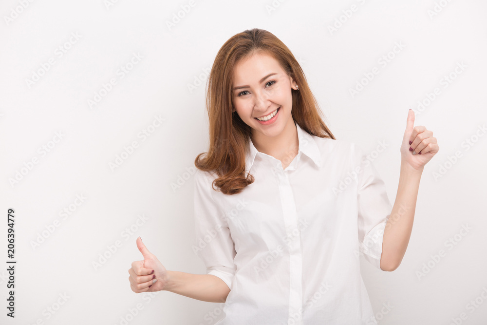Happy young woman giving thumbs up on white background Happy young woman giving thumbs up on white background