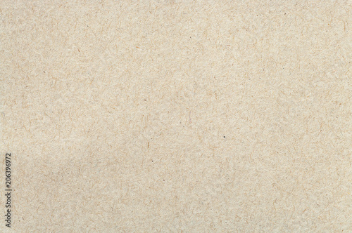 Cardboard sheet closeup. Abstract texture or background.