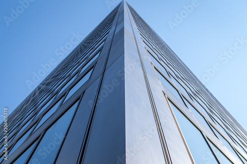 Wallpaper Mural Up view of office building with windows blue skies Torontodigital.ca