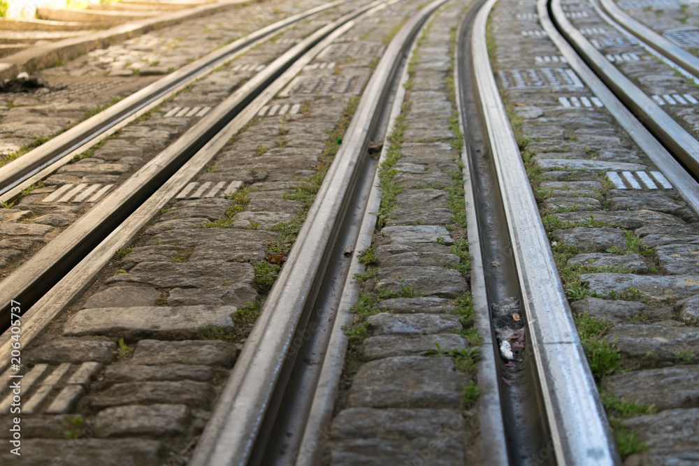 Close up image of tramway tracks on the road