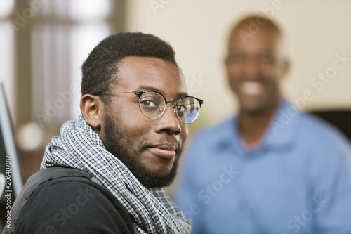 Close Up Business Man in an Office with Colleague