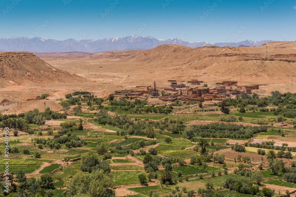 Ait Benhaddou village valley with Atlas mountains in the background
