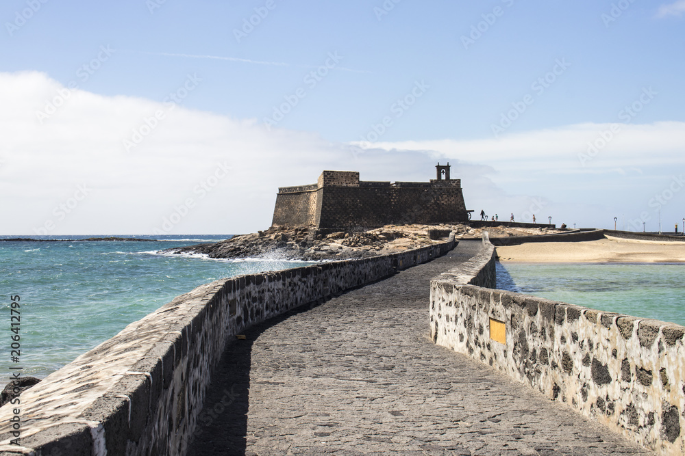 Spanish fortressof Lanzarote at rough sea