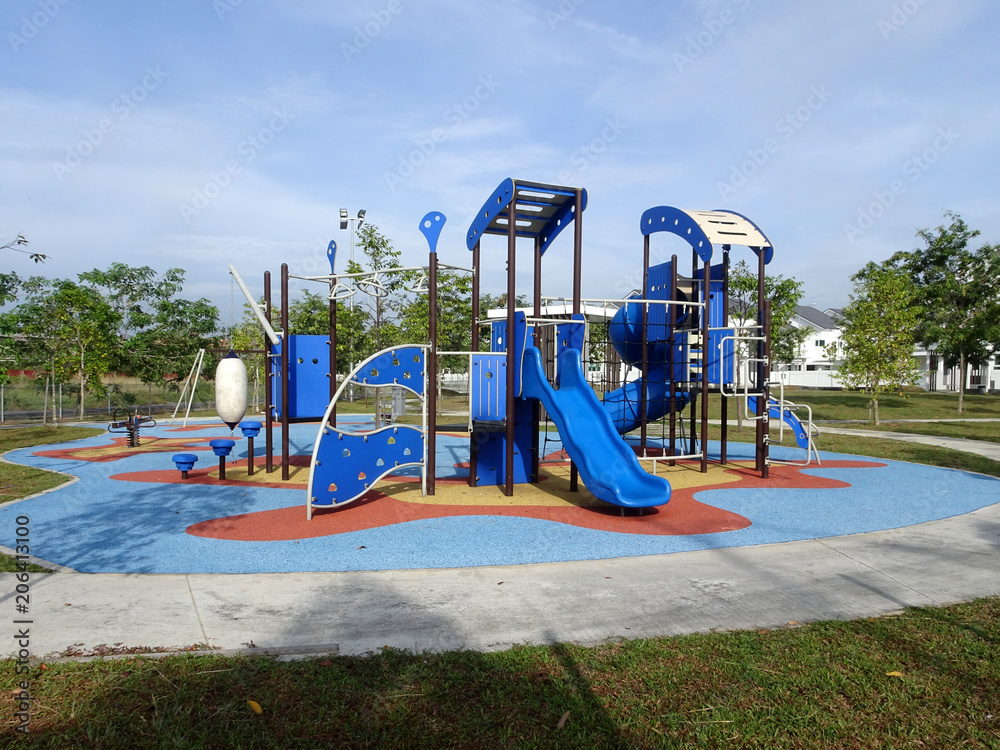 Selected focused of modern children outdoor playground in the public park.  It was design with few different themes for kids to enjoy. Stock Photo |  Adobe Stock