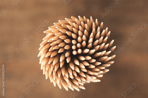 Many toothpicks in a round formation photo