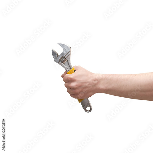 Hand holding adjustable wrench isolated on white background photo