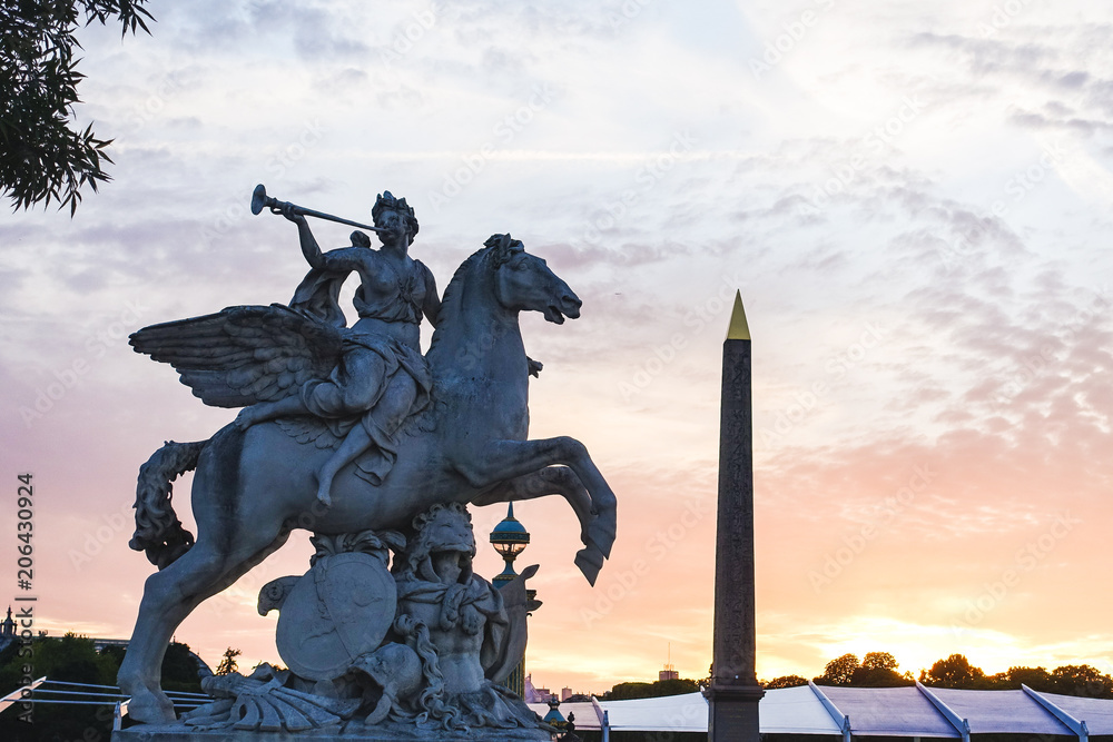 Fototapeta premium statue at sunset in europe