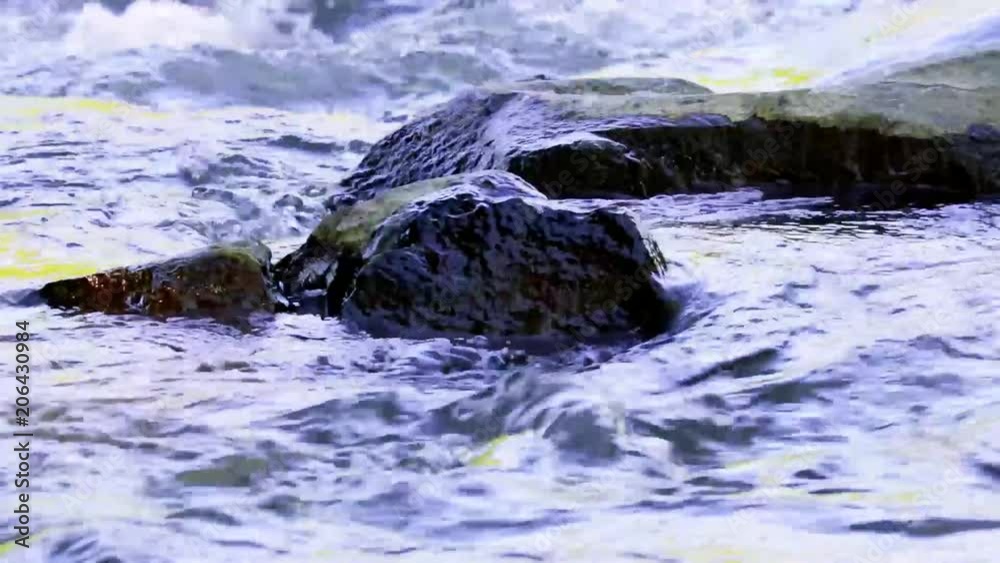 Water rolling over rocks Water rolling over rocks