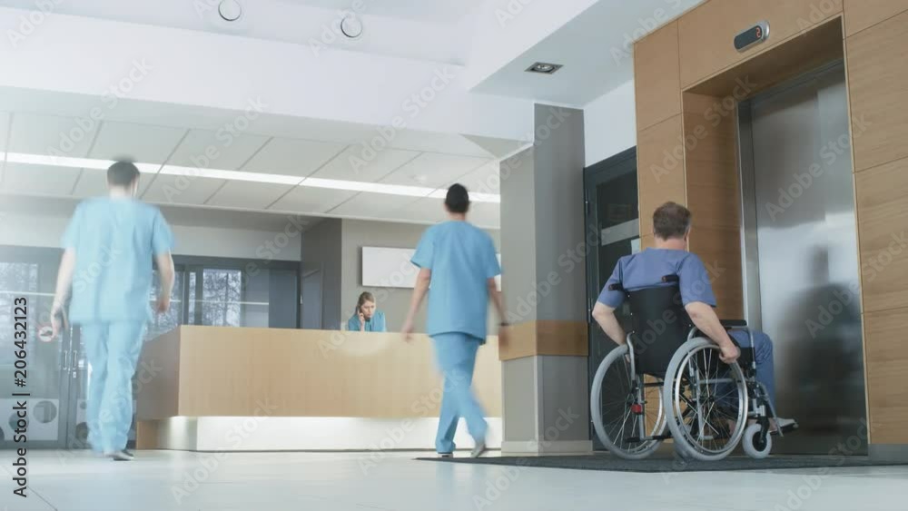 Time Lapse in the Hospital. Doctors, Nurses, Assistant Personnel and Patients Working and Walking in the Lobby of the Medical Facility. Shot on RED EPIC-W 8K Helium Cinema Camera.