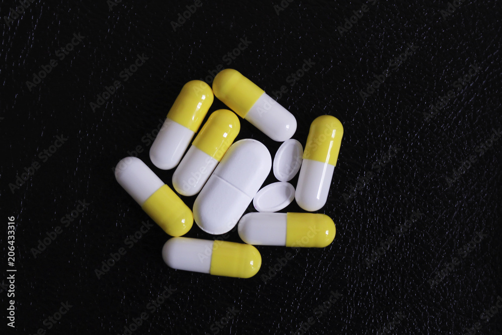 Pills on a black background Pills on a black background