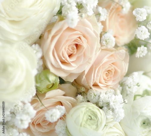 Blur effect, soft focus flowers background with bouquet of pale pink roses.Close up. Beautiful Holiday background