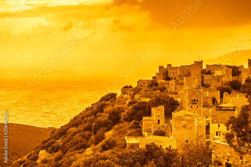 Tower houses in Vathia at sunset Greece Mani Peninsula photo