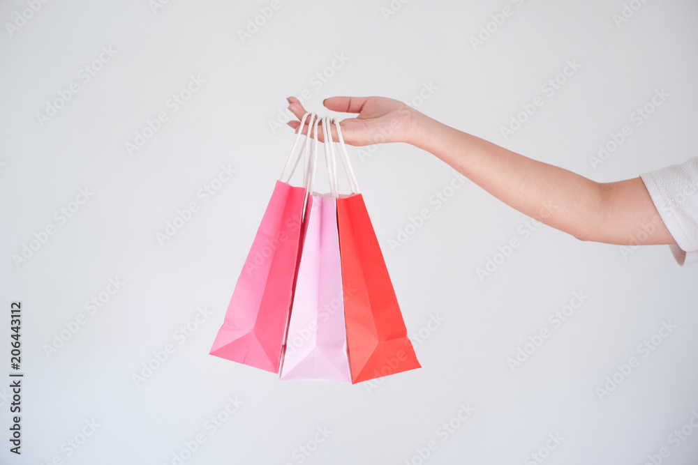 woman holding shopping bag