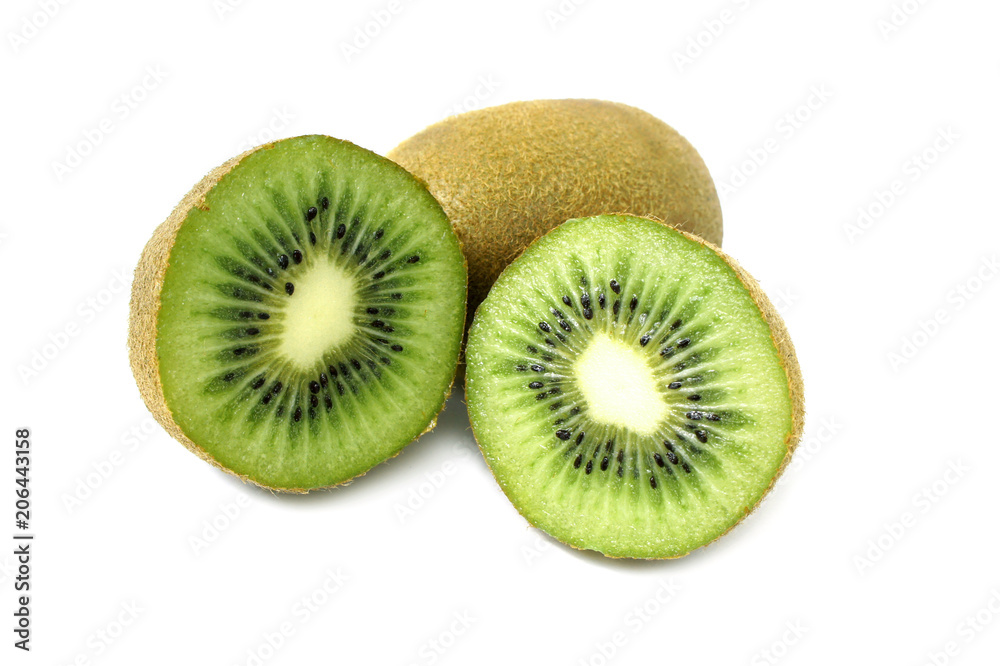 Kiwi halves on a white background. Close up. Kiwi halves on a white background. Close up.