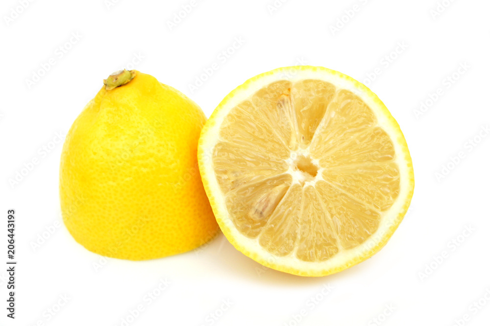 Two halves of lemon on white background