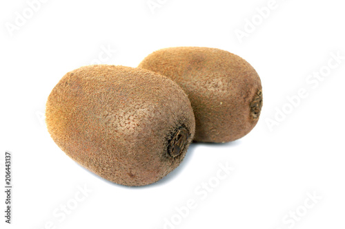 Two kiwis on a white background. Ripe fruit.