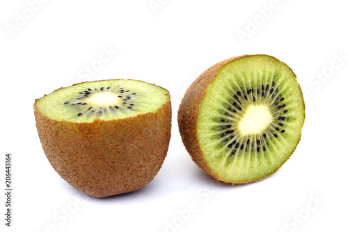 Two halves of kiwi fruit on white background. Close up.