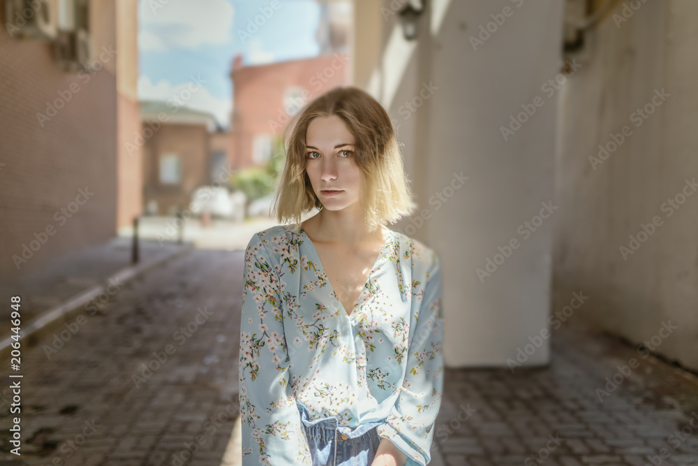 Summertime portrait of young woman with green eyes. Summertime portrait of young woman with green eyes.