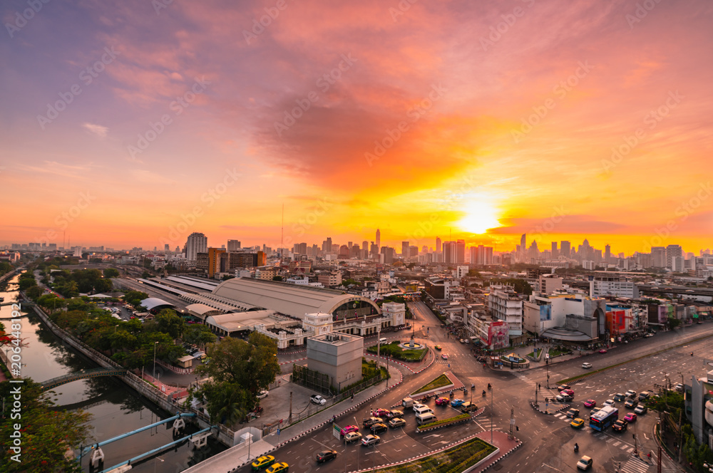 Aerial view of Bangkok cityscape with bangkok railway station at sunset