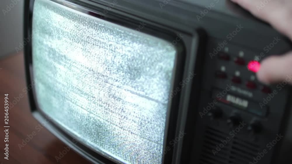 Close up of channel switching on an old TV