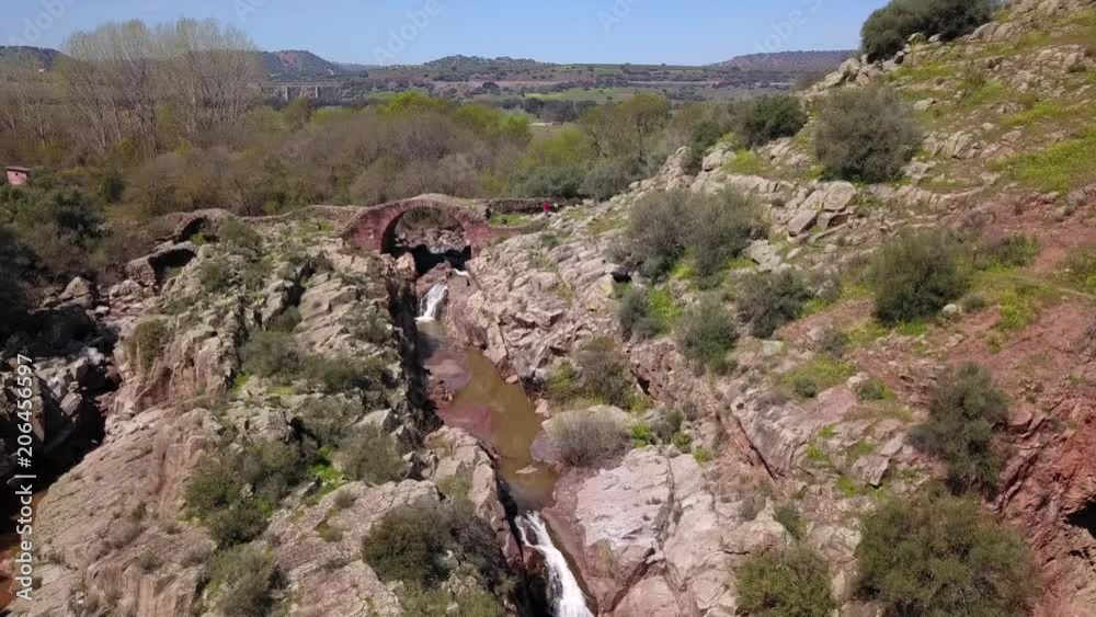 Roman Bridge of Vadollano, which is part of the route of the route Augusta, enclave of special scenic and historical interest, Linares, , Spain Roman Bridge of Vadollano, which is part of the route of the route Augusta, enclave of special scenic and historical interest, Linares, , Spain