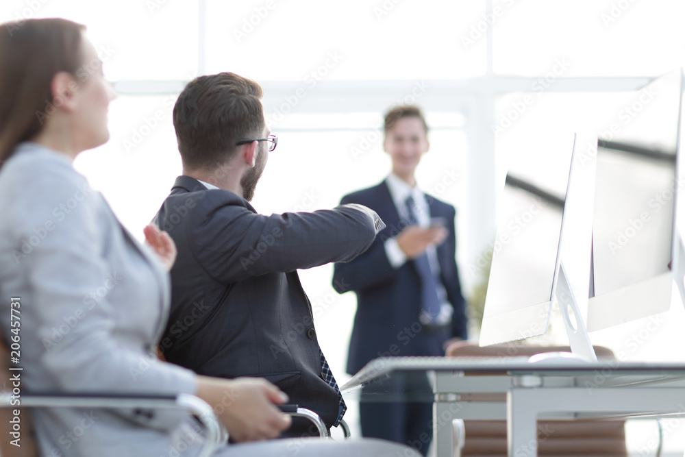 prospective employees are talking at their Desk prospective employees are talking at their Desk