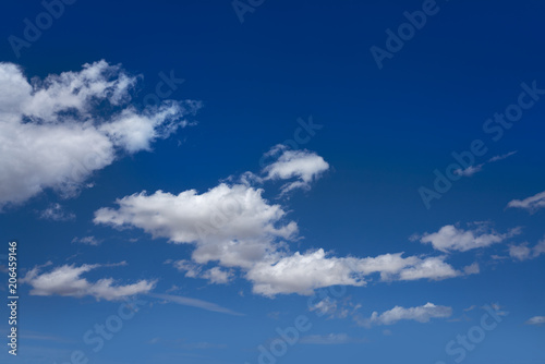 cumulus clouds perfect white in blue sky
