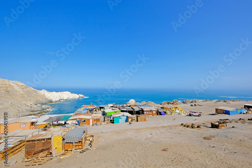 Small colorful fishing village on the pacific coast  south of Iquique  Chile  South America