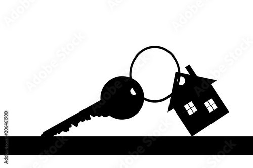 Vector silhouette of keys from the house on the table.