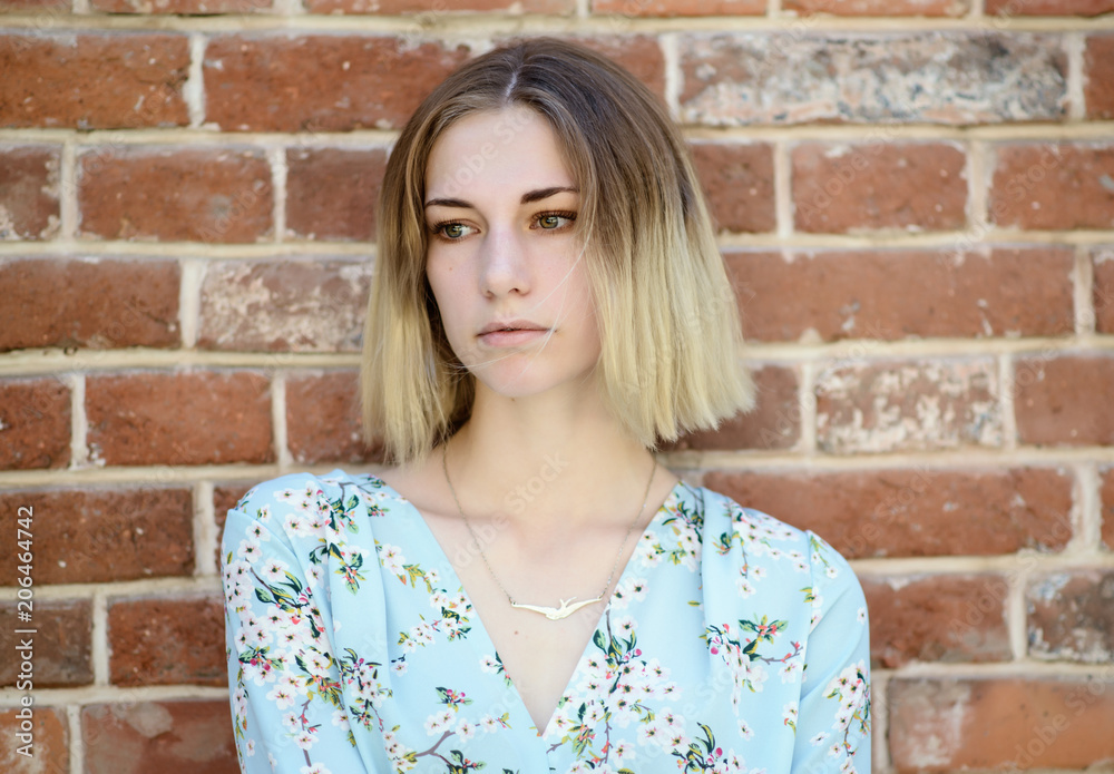 Summertime portrait of young woman with green eyes. Summertime portrait of young woman with green eyes.