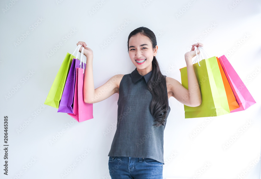 Happy Asain woman with shopping bag,shopping concept. Happy Asain woman with shopping bag,shopping concept.
