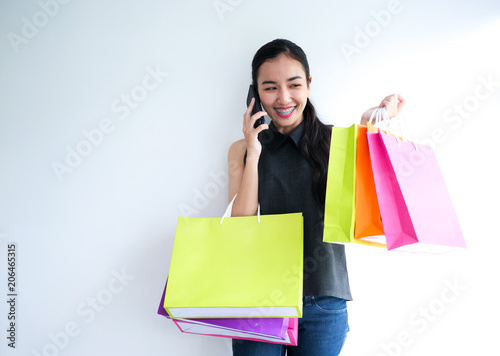 Happy Asain woman with shopping bag,shopping concept.