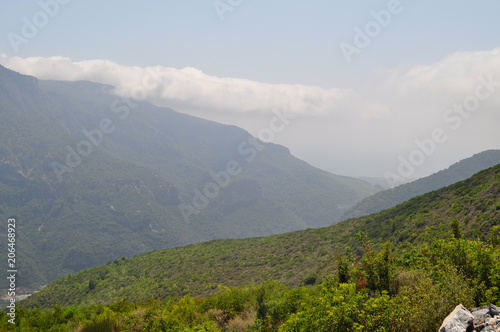 view of the mountains and the river on a sunny day in Turkey