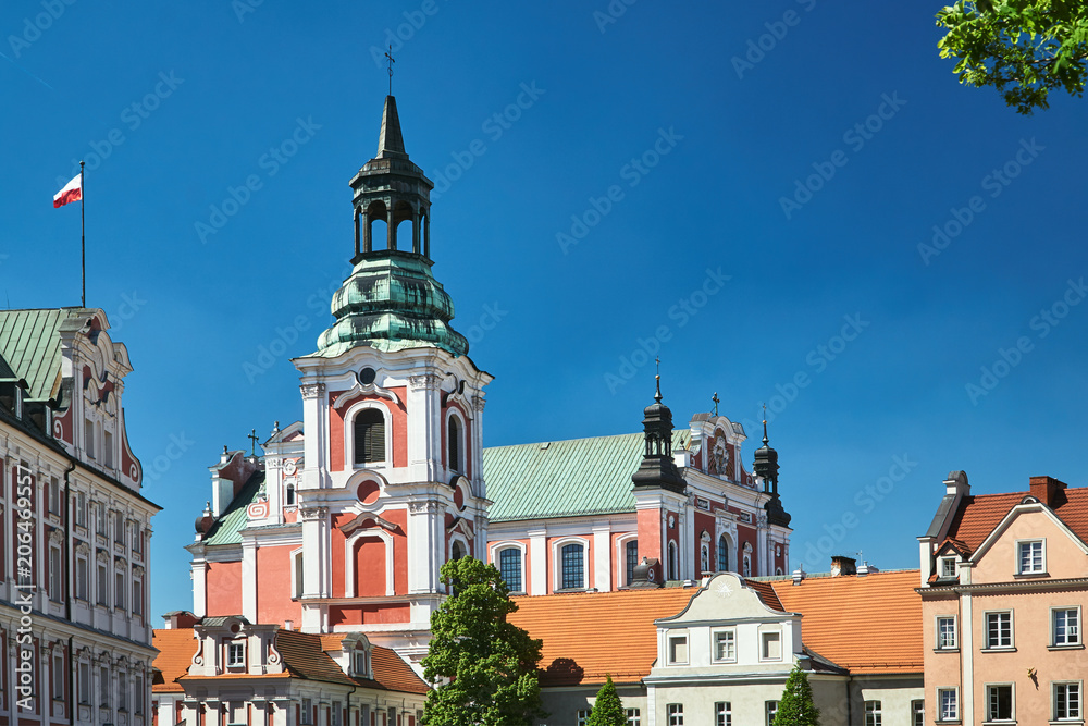 buildung and belfry of baroque Catholic Church in Poznan.