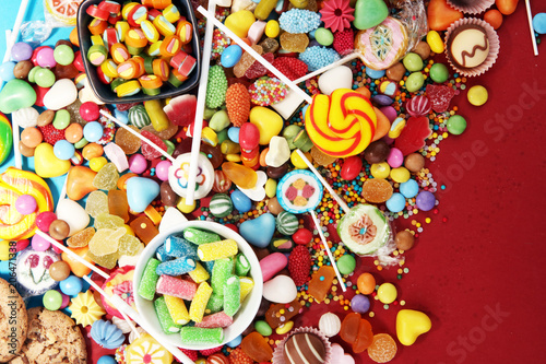 candies with jelly and sugar. colorful array of different childs sweets and treats © beats_
