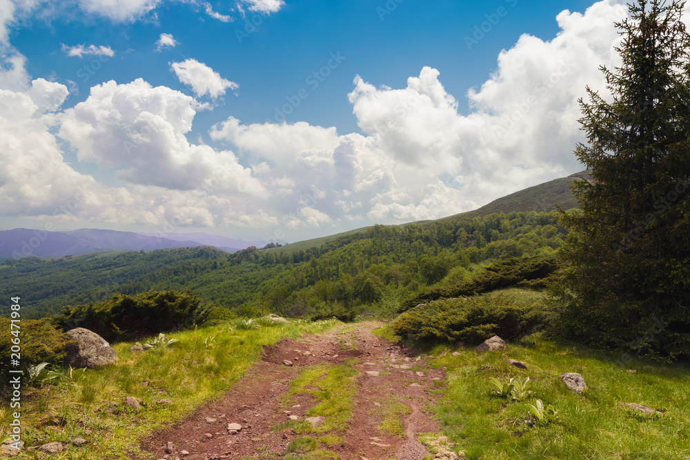 Fototapeta premium Mountain landscape view on a valley from mountain peak.