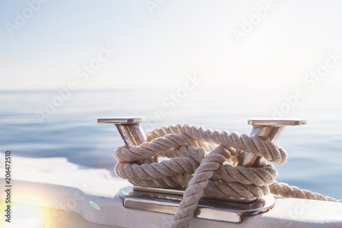 Ship's ropes on the yacht in Ligurian Sea, Italy. Close Up © yatcenko