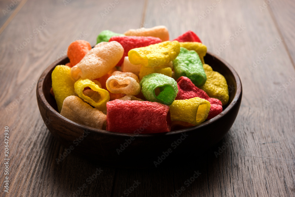 Basundi Or Rabri is an Indian sweet popular in Gujarat and Maharashtra. It is a sweetened condensed milk. Garnished with Dry fruits and Saffron. Served in a bowl over moody background. Selective focus