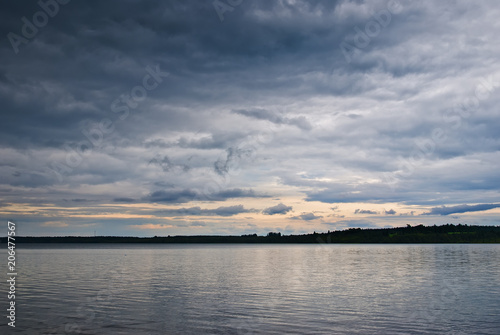 Fototapeta Naklejka Na Ścianę i Meble -  4691040 Dark clouds over the lake