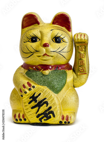 Fototapeta Naklejka Na Ścianę i Meble -  Gilded Chinese Asian or Feng Shui lucky charm cat with a paw raised in greeting denoting wealth and prosperity over a white background