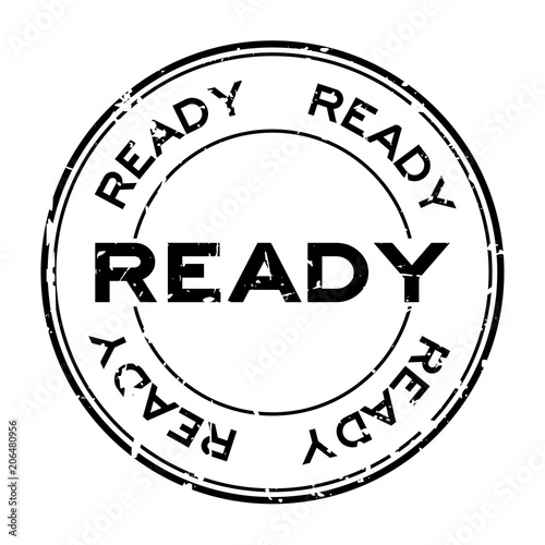 Grunge black ready round rubber seal stamp on white background